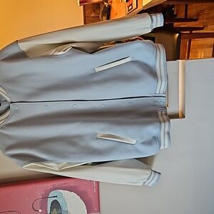 H and M Blue and white varsity style jacket. M